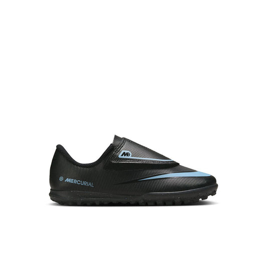 Kids soccer cleat shoe, black upper with blue accents and Nike swoosh, low profile