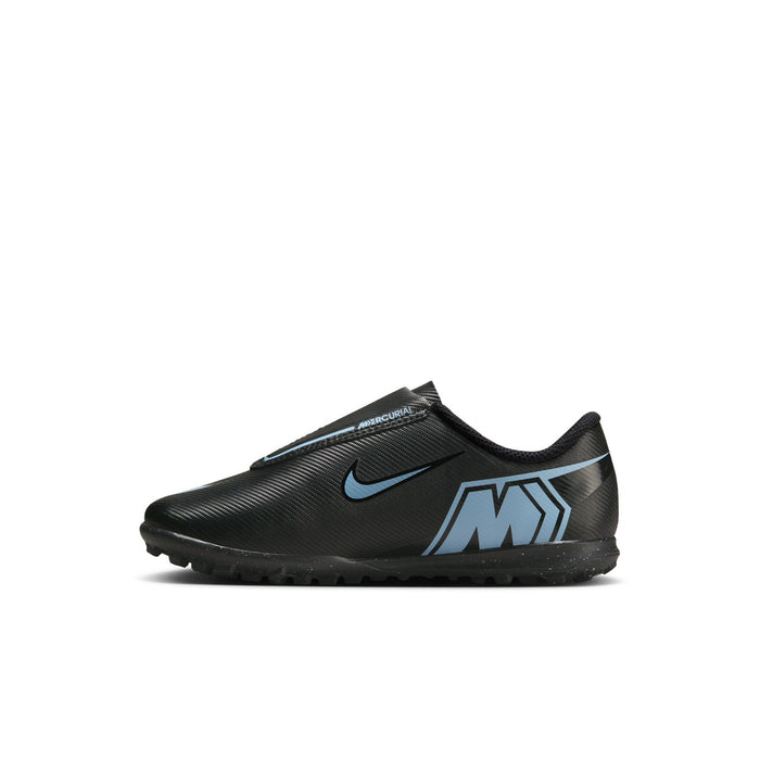 Kids soccer cleat shoe, black upper with blue logo and Nike swoosh, side view