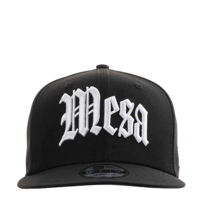 Black baseball cap with white front logo and curved brim