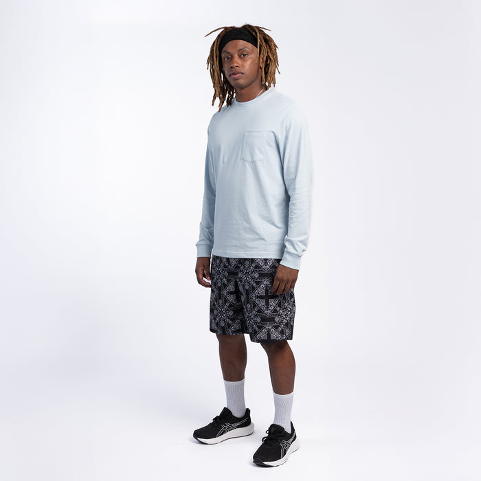 Men's mesh-lined woven short, side view showing black bandana print hem