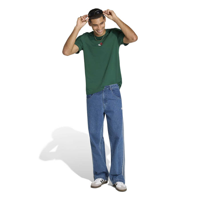 Green mens crewneck T-shirt with small chest graphic emblem, full outfit view