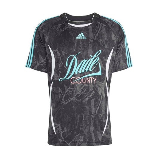 Men's dark graphic soccer jersey with teal shoulder stripes and 'Dade County' print
