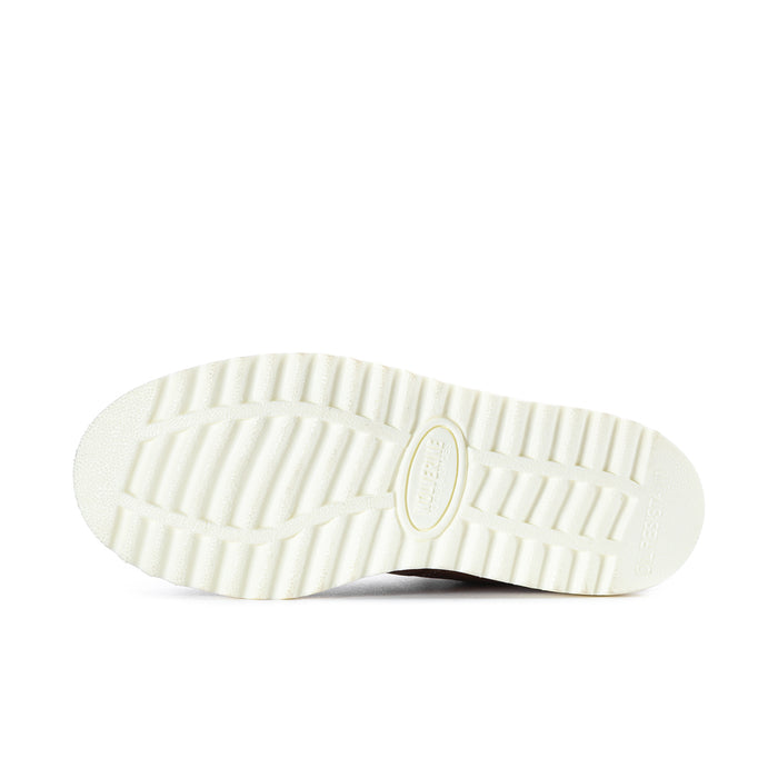 Work boot outsole with ribbed tread and circular logo