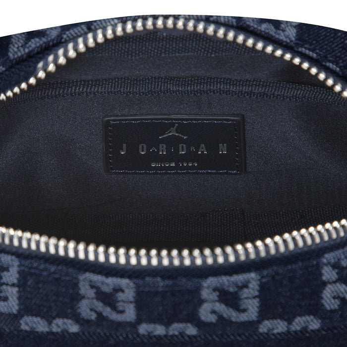 Dark indigo Jordan brand interior label on zip pocket