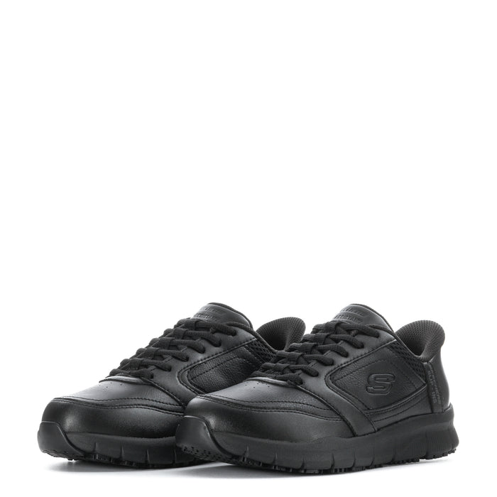 Pair of black low-top lace-up sneakers with textured panels and cushioned footbed
