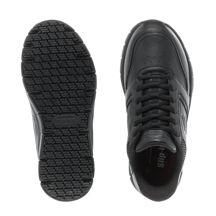 Black sneaker outsole and inner view: textured traction tread and laced upper