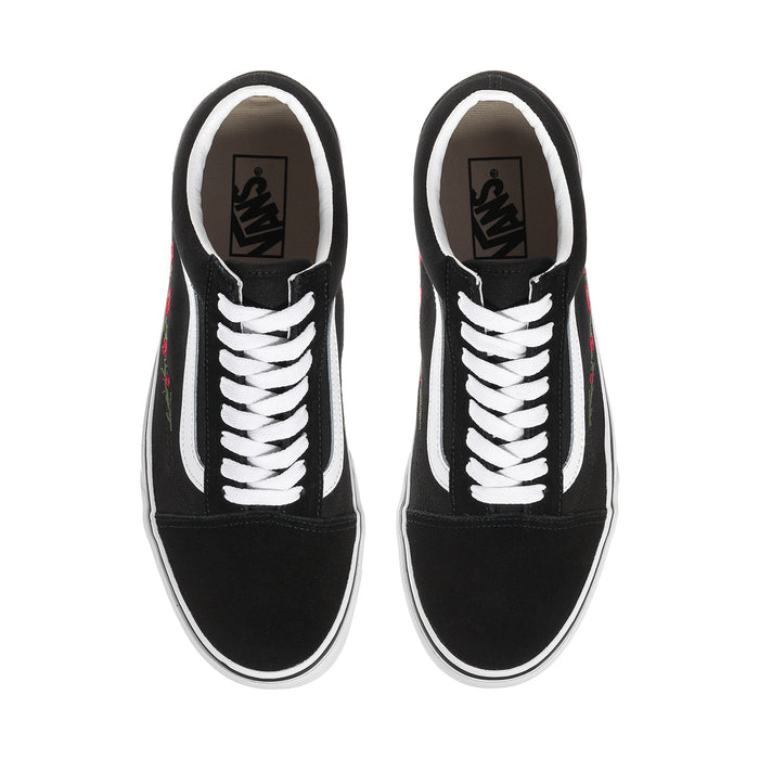 Men's low-top sneakers, black with white laces and contrast toe cap; view from above.