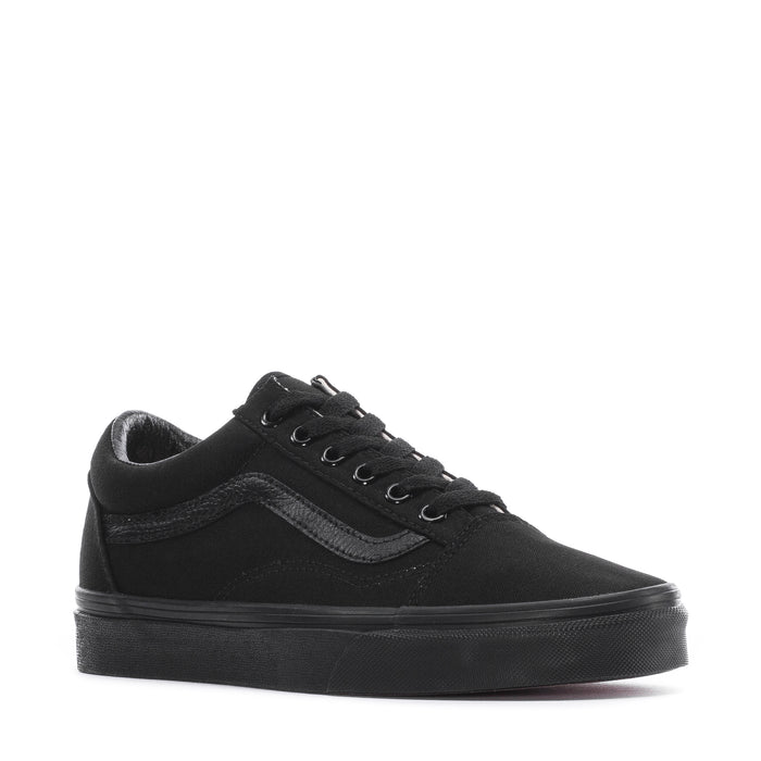 Black youth low-top canvas sneakers, front 3/4 view with lace-up and stripe detail
