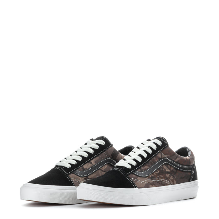 Pair of youth low-top sneakers, black with brown camo print, white lace-up