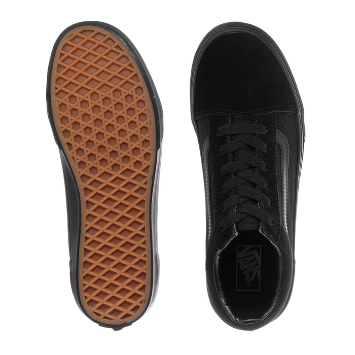 Black youth sneaker outsoles and interior lining with Vans logo