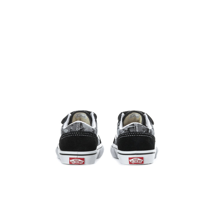 Kids black Vans sneakers back view with white midsole and red logo patch