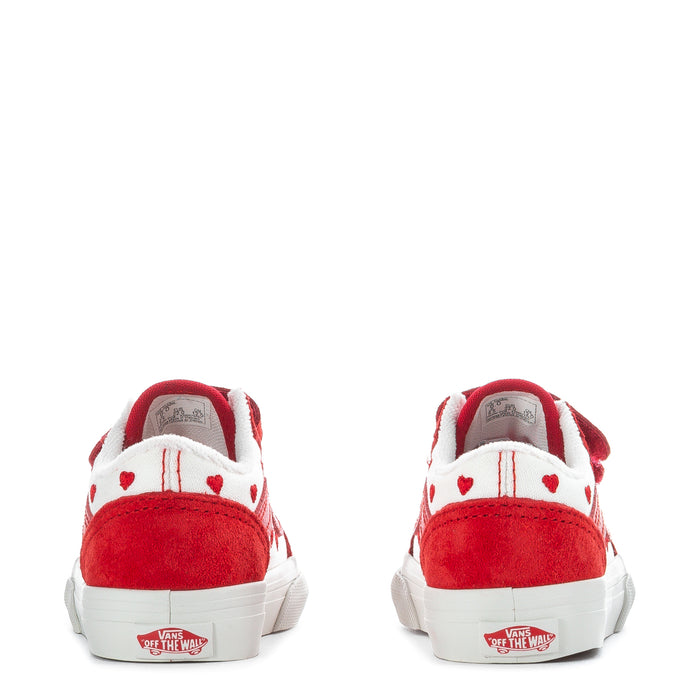 Toddler red and white sneakers, heel view with Vans logo patch