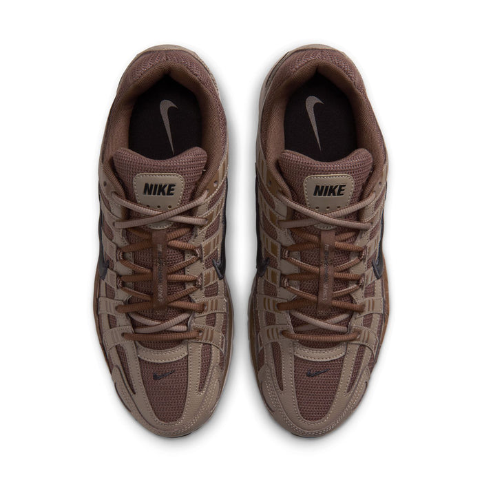 Men's brown sneakers front view, lace-up with Nike logo on tongue