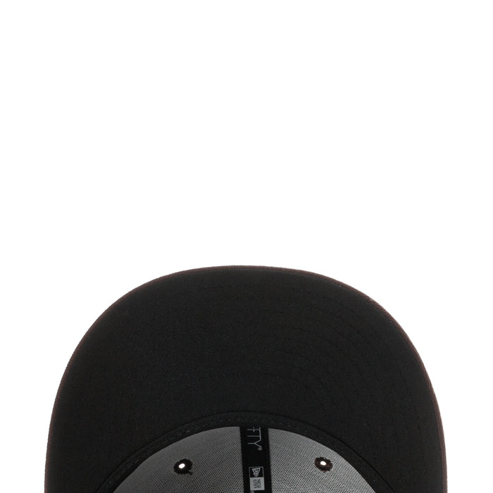 Black baseball cap sweatband close-up with gray inner band
