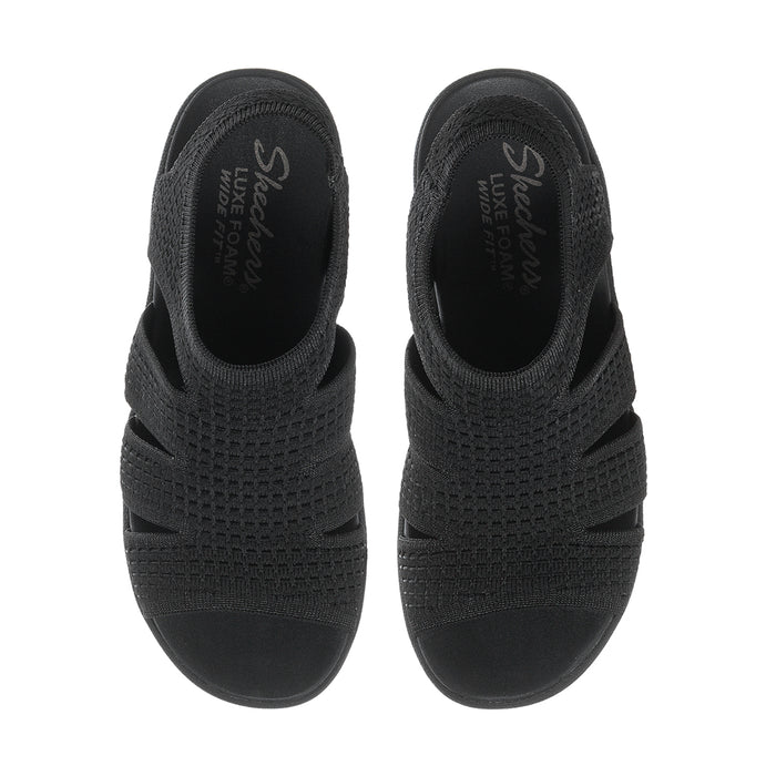 Black women's slingback platform sandals, back view with heel cup and knit footbed