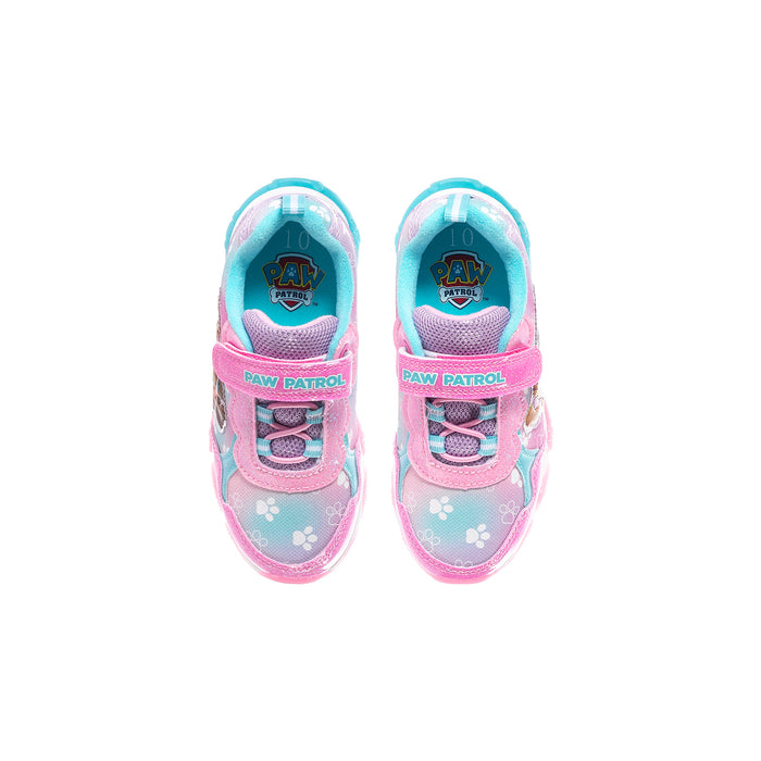 Pair of light-up toddler sneakers with Paw Patrol logo on blue-pink tongue