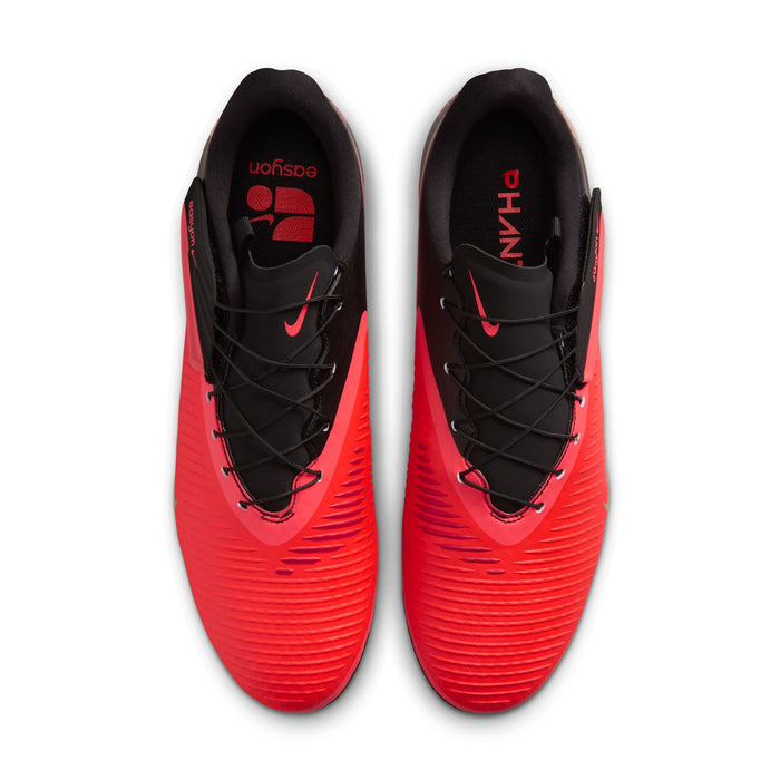 Pair of men's FG soccer cleats, bright red with black tongue and lace-up front