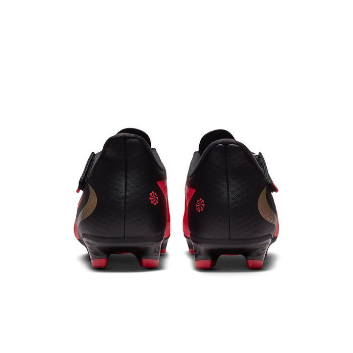 Men's FG soccer cleats from heel view in black with red accent and stud outsole