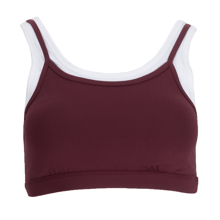 Women's layered sports bra in burgundy with white trim and racerback straps