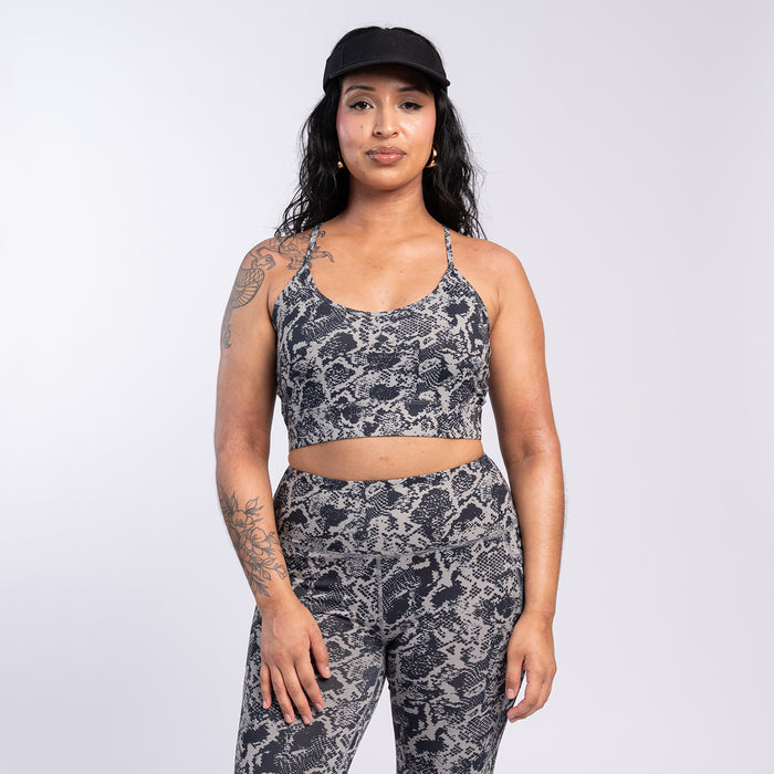 Womens snake-print sports bra with scoop neck and wide racerback-style straps