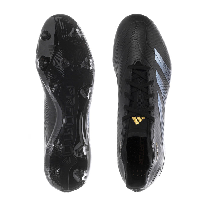 FG soccer cleats shown from sole with molded studs and black textured surface