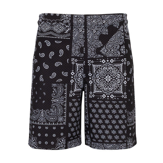 Men's black mesh shorts with paisley patchwork all-over print and elastic waist