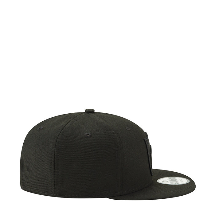 Black baseball cap side profile with curved brim and small side logo patch