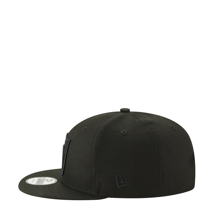 Black baseball cap with New Era logo on side panel, curved brim
