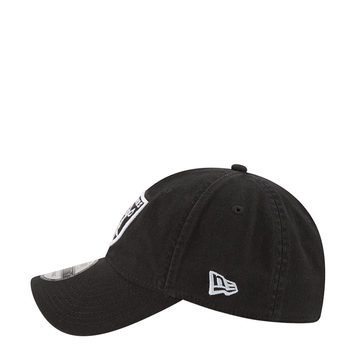 Black Raiders baseball cap with New Era flag and white Raiders shield patch