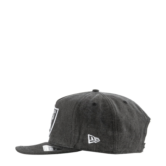 Washed black Raiders denim cap with small side logo patch and curved brim