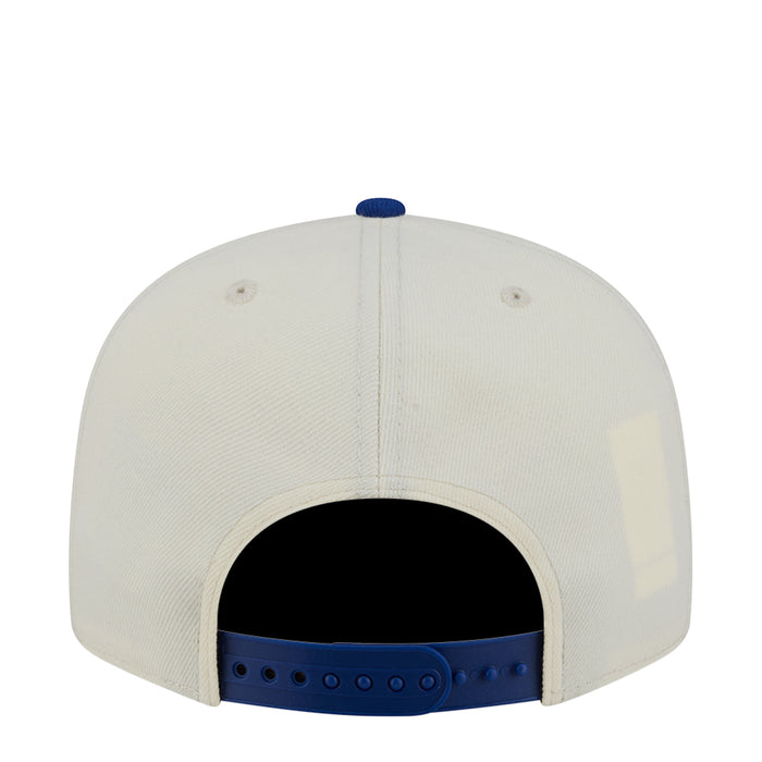 Two-tone baseball cap in light gray and blue, back view with snapback closure