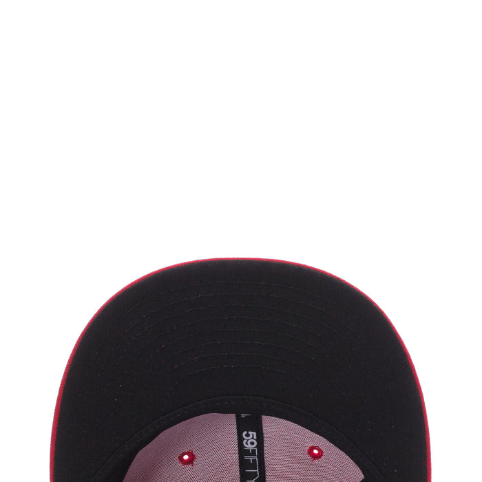Black 59FIFTY cap close-up with interior band and 59FIFTY label