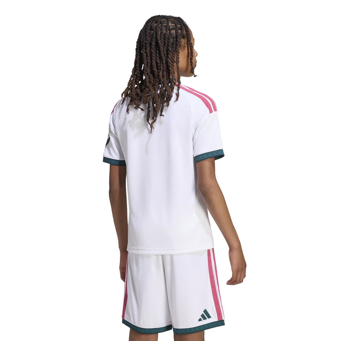 Back view youth home soccer jersey in white with pink shoulder stripes and teal trim