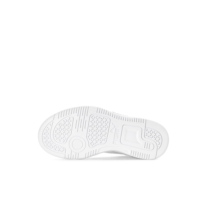 Kids white sneaker outsole view with traction tread pattern