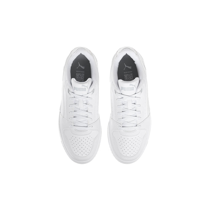 Youth Puma white sneakers viewed from above, lace-up eyelets and perforated toe
