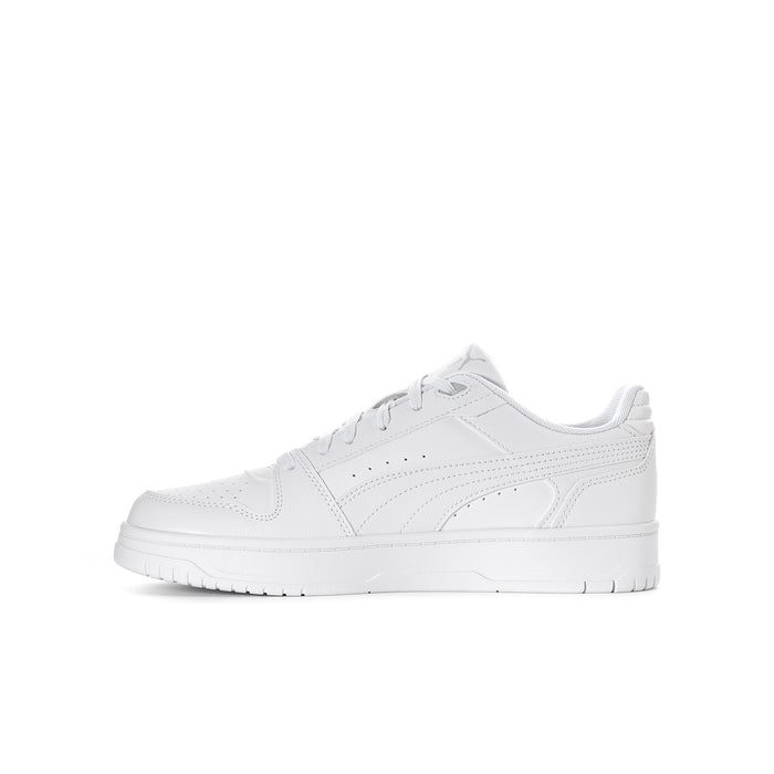 Single youth Puma white low-top sneaker, lace-up front and textured side panel
