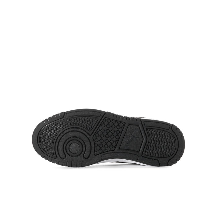 Youth sneaker outsole and heel tread in dark rubber with textured pattern