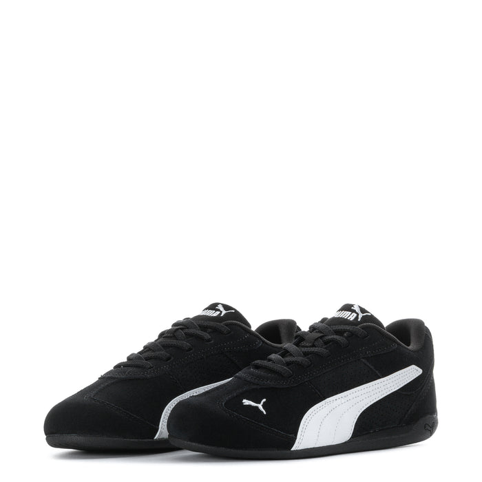 Pair of kids black Puma sneakers with white side stripe and lace-up design
