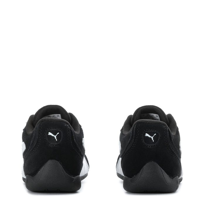 Kids black Puma sneakers heel view with logo on back tab and contrast trim
