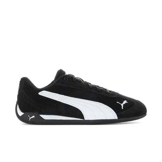 Women's black and white low-top lace-up sneakers with PUMA logo