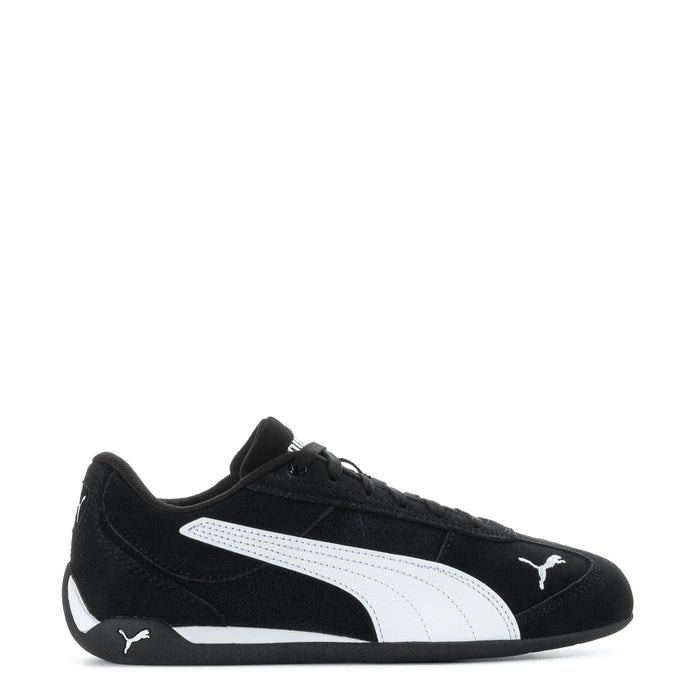 Youth black Puma suede sneakers with white stripe and lace-up front