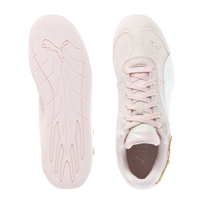 Youth sneakers, light pink uppers with laces; sole and toe logo shown