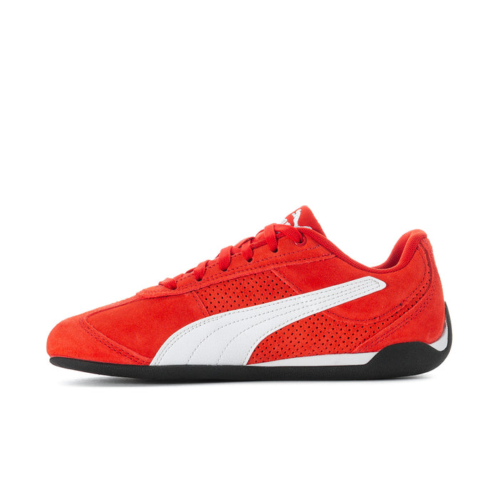 Women's red suede sneakers, front 3/4 view with white band and lace-up