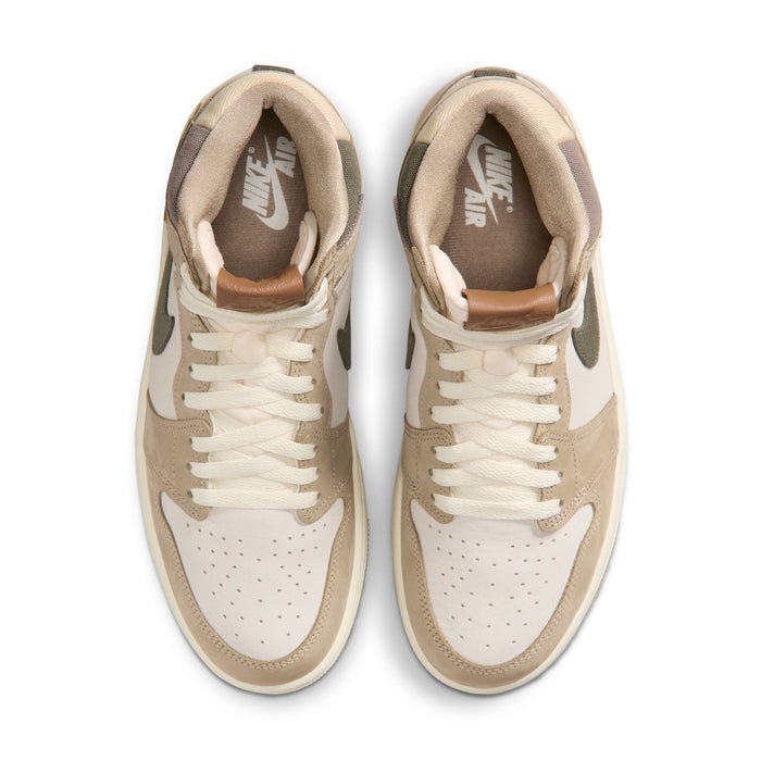 Front view of high-top sneakers with sail laces, perforated toe, and tan leather panels