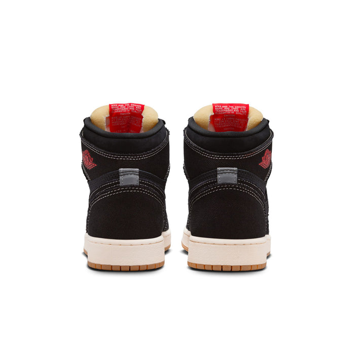 Black youth high-top sneakers with red heel tabs, white midsole, gum outsole.