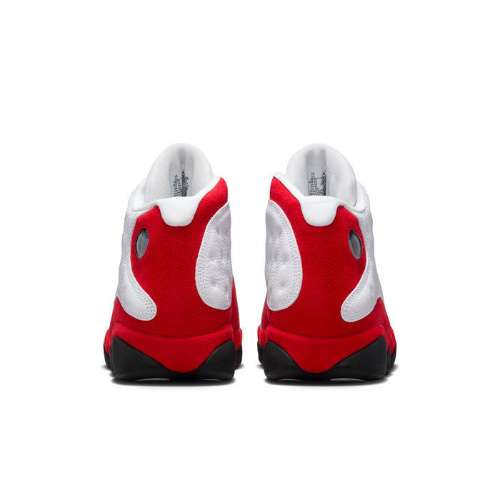 Heel view of white and red high-top sneakers with black heel detailing