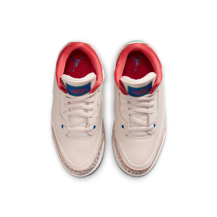 Kids retro sneakers, front view pair with off-white uppers and red interior