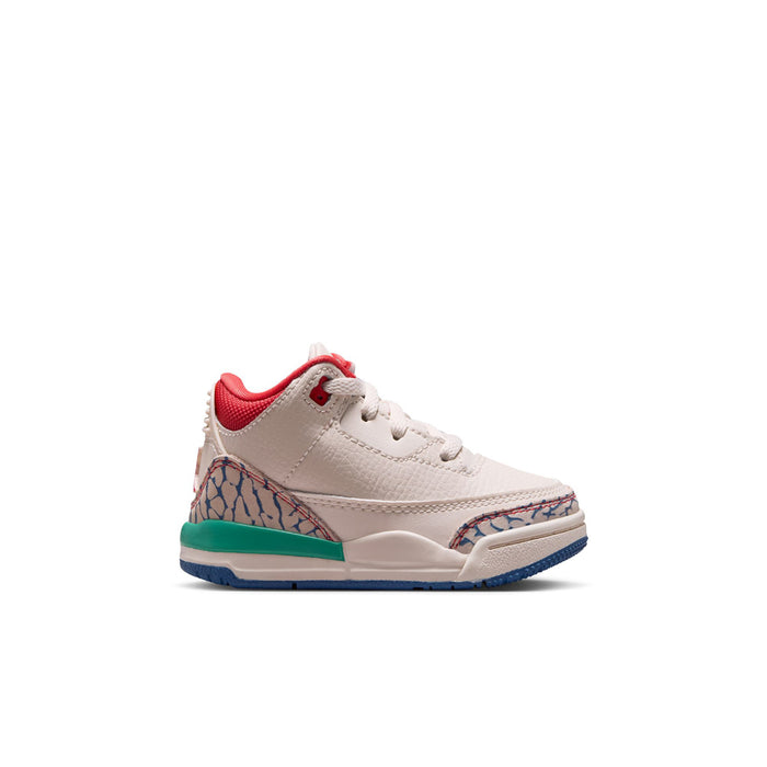Toddler low-top sneaker in cream leather with red collar and blue-green outsole