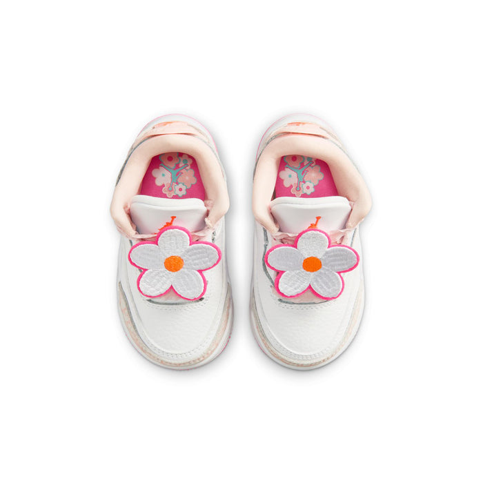 Toddler Retro 3 sneakers, top view, white with pink flower appliqués