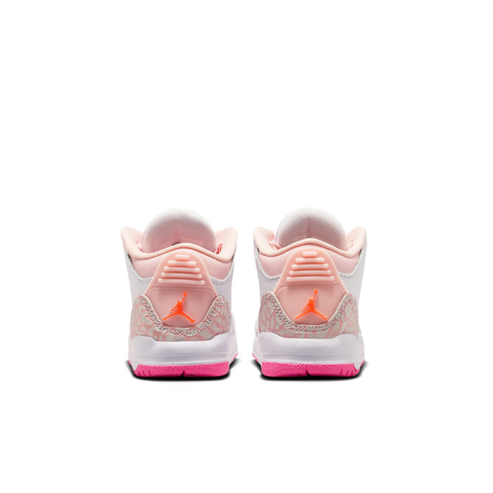 Toddler high-top sneakers with pink heel and orange Jumpman-style logo